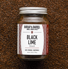Load image into Gallery viewer, small glass jar with white label of Burlap & Barrel Black  Ground Lime