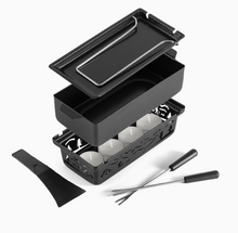 Load image into Gallery viewer, Black wax melt tin set with a lid, three tiers of tin cups, a scraper tool, and two metal wicks on a white background.