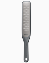 Load image into Gallery viewer, A gray metal hand grater with a matching gray handle, shown vertically against a plain white background. Zyliss Rasp Grater (Zester, Microplane)