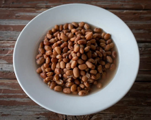 Load image into Gallery viewer, Bowl of Rancho Gordo Buckeye Bean aka Yellow Indian Woman Heirloom beans.