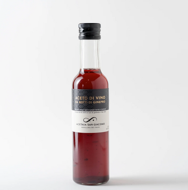Raw, naturally acidified red Lambrusco raw wine vinegar aged in juniper barrels by Acetaia San Giacomo, Italy.
