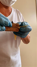 Load image into Gallery viewer, Caponi pasta artisan measuring thickness of egg noodle.