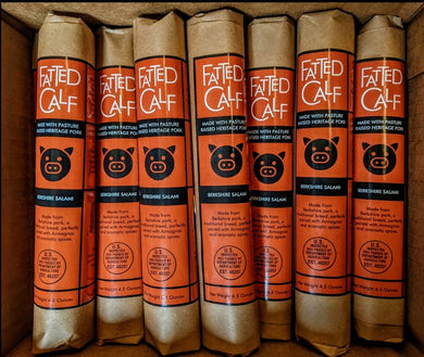Box of Fatted Calf Berkshire Salami, wrapped in kraft paper, with red and black label (Napa, California).