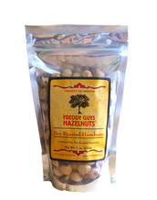 Load image into Gallery viewer, Freddy Guys roasted hazelnuts from Oregon in clear/foil zip lock bag.
