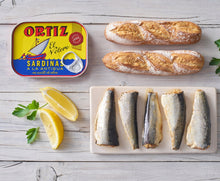 Load image into Gallery viewer, Conservas Ortiz sardines on board with bread, Spain.