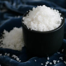 Load image into Gallery viewer, Fleur de Sel in black cup.
