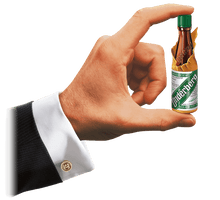 Load image into Gallery viewer, Underberg mini bottle in man's hand.