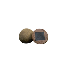 Load image into Gallery viewer, Two small oval stone-like pieces, one showing a smooth brownish surface and the other showing a rough side with a dark square recess, on a plain off-white background.  Lakrids by Bulow original flavor.
