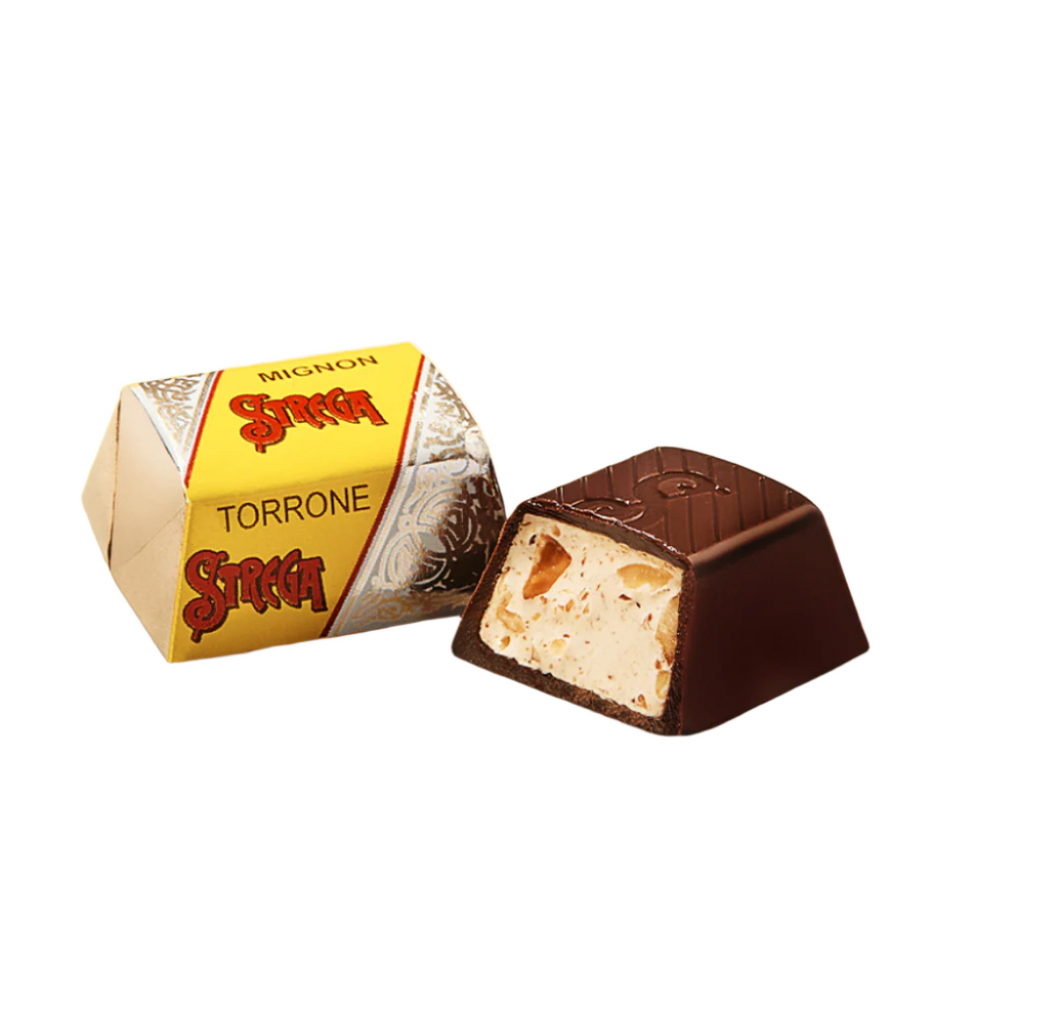 Strega Torrone candy with packaging on a yellow background