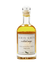 Load image into Gallery viewer, Bottle of Gris Gris cocktail magic jalapeño hex syrup on a white background
