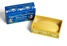 Load image into Gallery viewer, Pretty blue box of Eiwit Zeep eggwhite soap with chamomile flowers and Swiss girls in colorful dresses on the left and right side.  Oval embossed bar of soap next to box.  White background.
