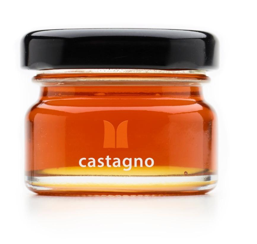 Small mini jar of Mieli Thun's deep amber Chestnut  Honey  28 g.