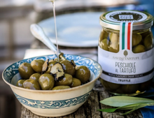 Load image into Gallery viewer, Bowl of green olives with a jar of Savini Tartufi truffle-flavored olives on a wooden surface.
