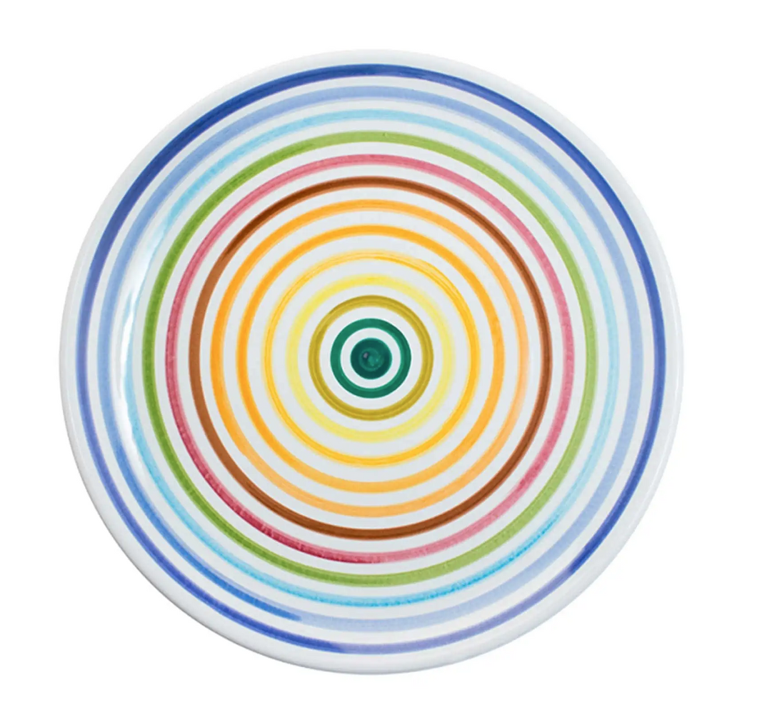 Beautiful and bright rainbow pattern, hand painted, terracotta dinner plates, Puglia, Italy.