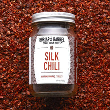 Load image into Gallery viewer, Burlap &amp; Barrel Small Clear Glass Jar of Silk Chili Spice
