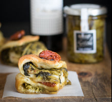Load image into Gallery viewer, Warm sandwich made with De Carlo rapini and cheese.
