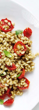 Load image into Gallery viewer, Sun-Kissed Cherry Tomatoes in Barley Salad, On White Plate
