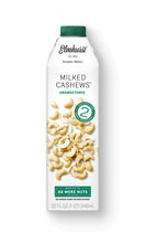 Load image into Gallery viewer, White carton with green lettering, and image of raw cashews on front.  Elmhurst Milked Cashews.
