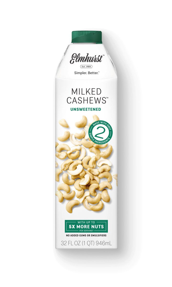 White carton with green lettering, and image of raw cashews on front.  Elmhurst Milked Cashews.