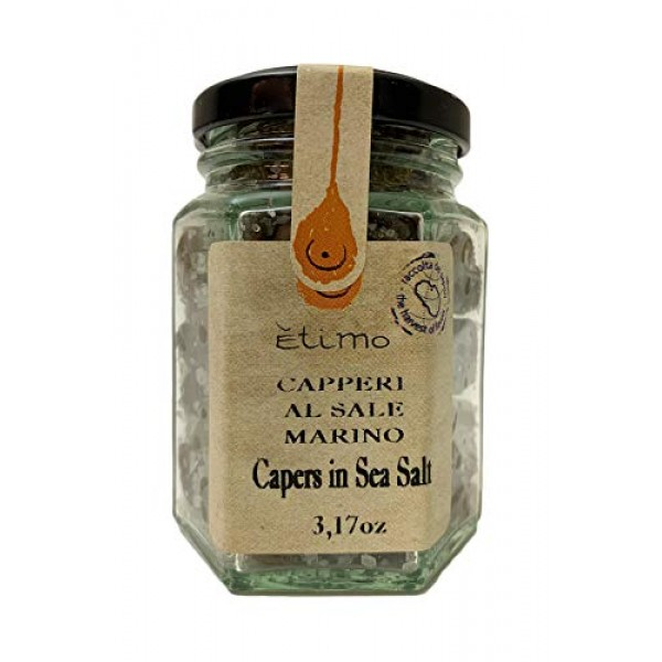 Small glass 6 sided jar, filled with salted capers from Pantelleria Island, Sicily.
