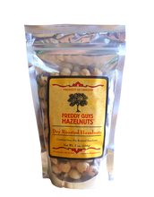 Load image into Gallery viewer, Freddy Guys roasted hazelnuts from Oregon in clear/foil zip lock bag.
