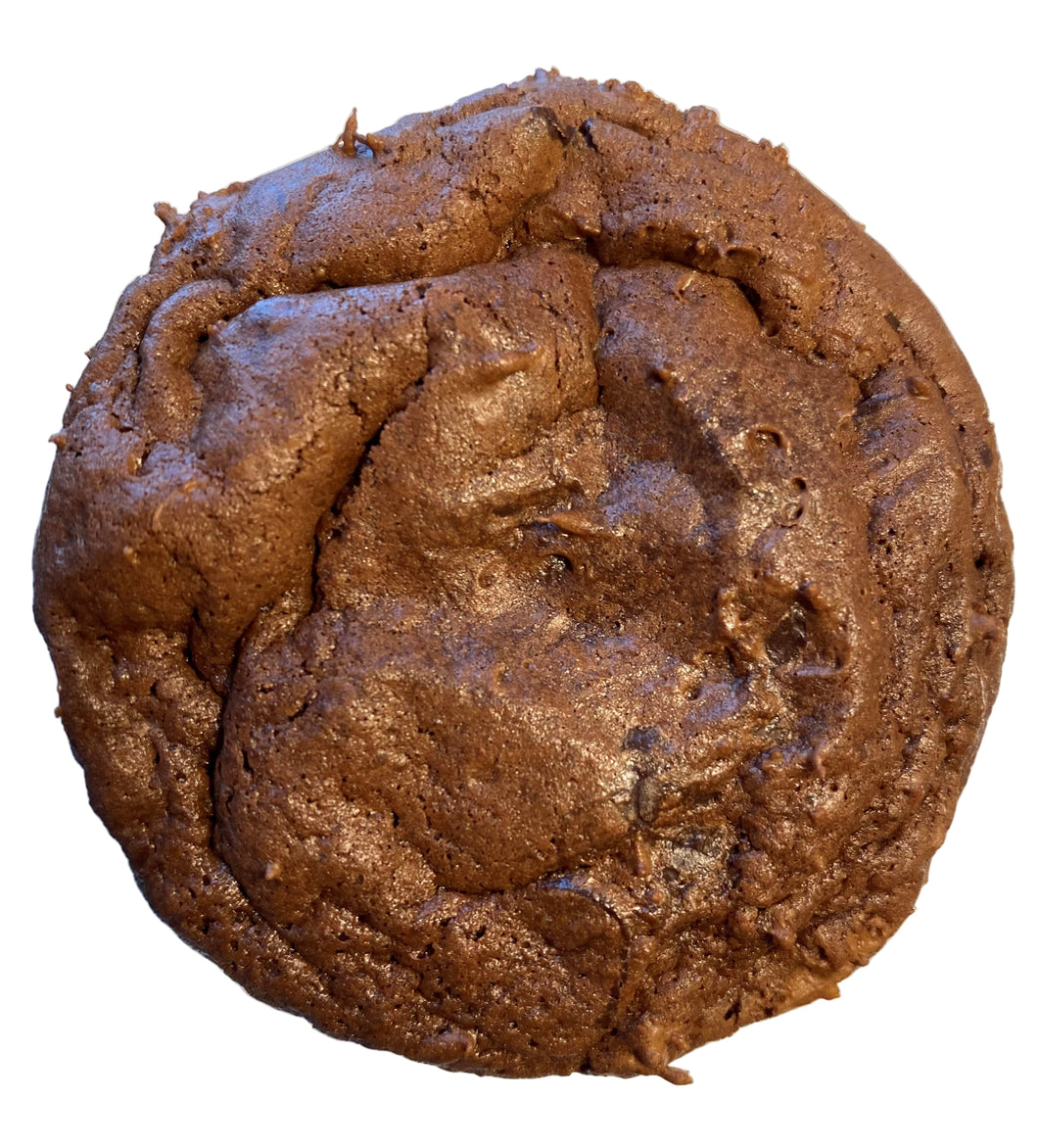 A single large, chocolate brownie cookie on a white plate.