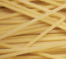 Load image into Gallery viewer, close-up of long strands of Spaghettoni pasta 
