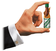 Load image into Gallery viewer, Underberg mini bottle in man&#39;s hand.
